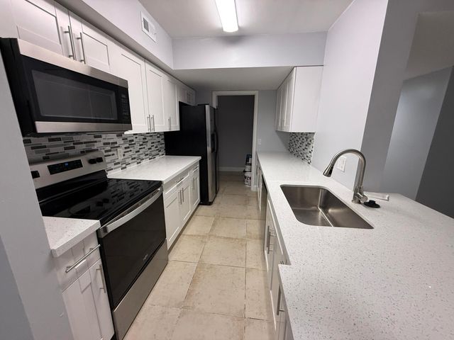 5760 Rock Island Road 309, Tamarac, FL 33319