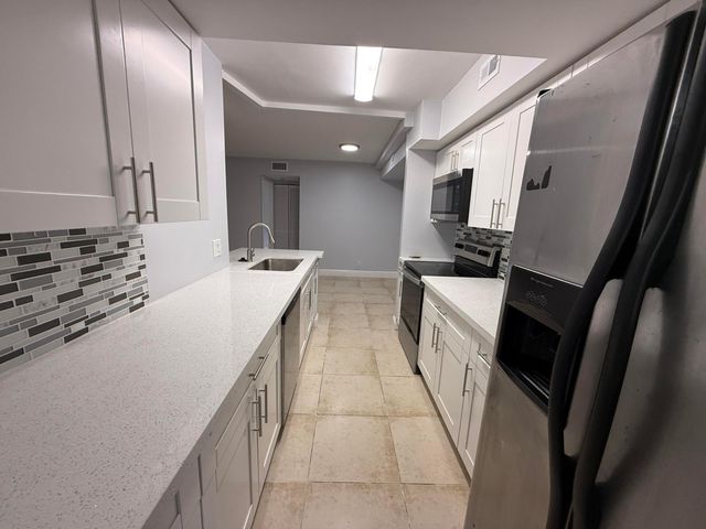 5760 Rock Island Road 309, Tamarac, FL 33319