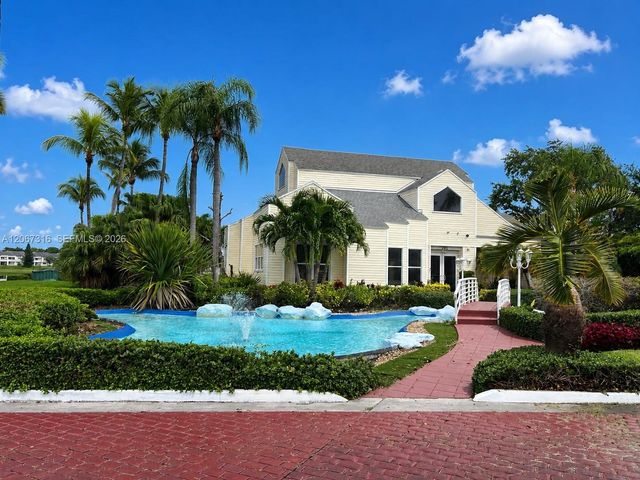 3409 NW 44th Street 106, Oakland Park, FL 33309
