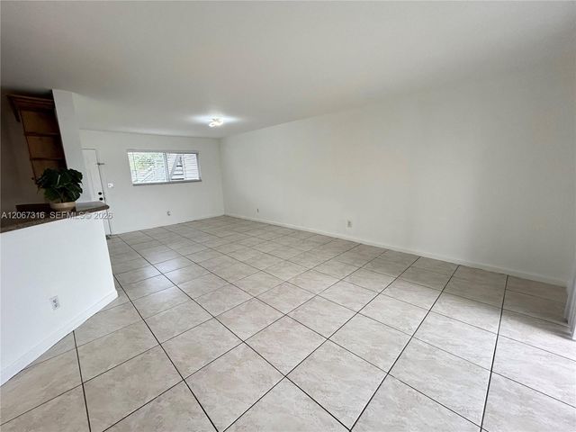 3409 NW 44th Street 106, Oakland Park, FL 33309