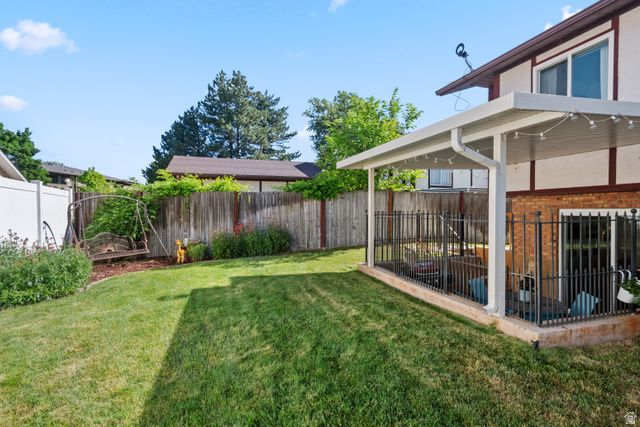 7002 S DEREK HOLLOW CV, Midvale, UT 84047