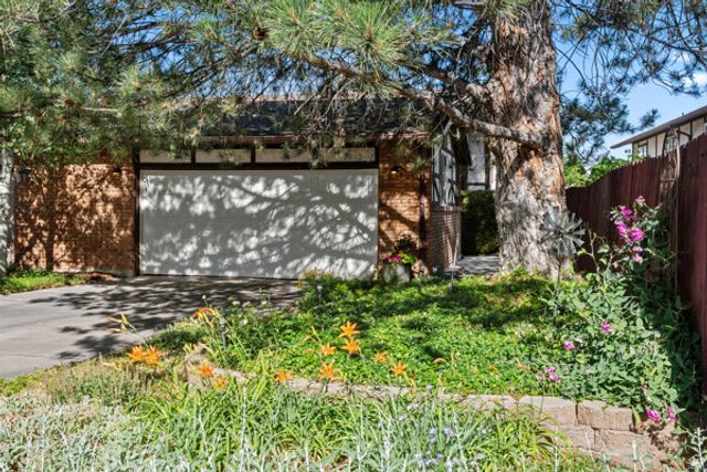 7002 S DEREK HOLLOW CV, Midvale, UT 84047