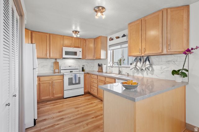 7002 S DEREK HOLLOW CV, Midvale, UT 84047