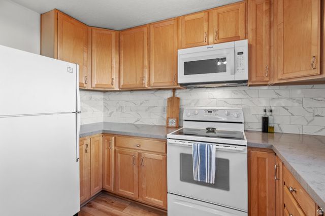 7002 S DEREK HOLLOW CV, Midvale, UT 84047