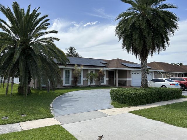 134 Galiano Street, Royal Palm Beach, FL 33411