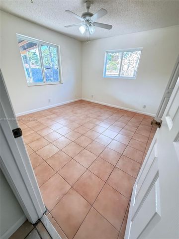 4797 Gladiator Cir, Green Acres, FL 33463