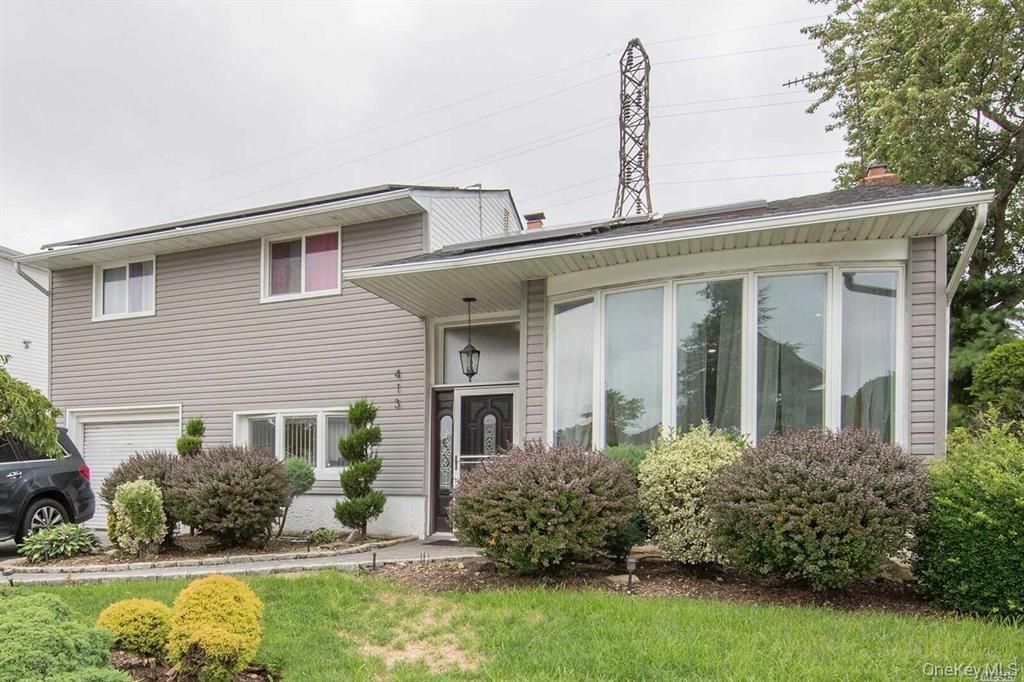 413 Clearmeadow Drive, East Meadow, NY 11554