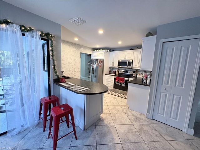 1409 Hancock Bridge PKWY, Cape Coral, FL 33990