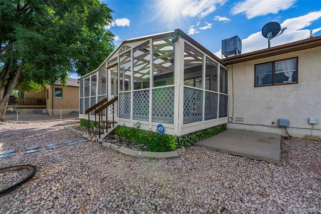 293 W Hahns Peak Avenue, Pueblo West, CO 81007