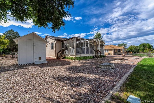 293 W Hahns Peak Avenue, Pueblo West, CO 81007