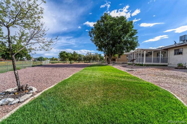 293 W Hahns Peak Avenue, Pueblo West, CO 81007