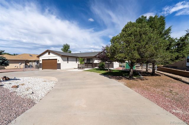 293 W Hahns Peak Avenue, Pueblo West, CO 81007