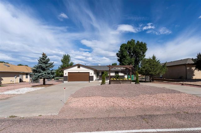 293 W Hahns Peak Avenue, Pueblo West, CO 81007