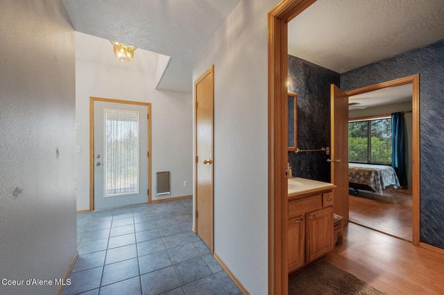 9067 W COEUR D ALENE DR, Spirit Lake, ID 83869