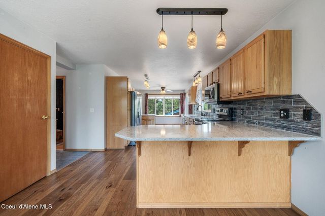 9067 W COEUR D ALENE DR, Spirit Lake, ID 83869