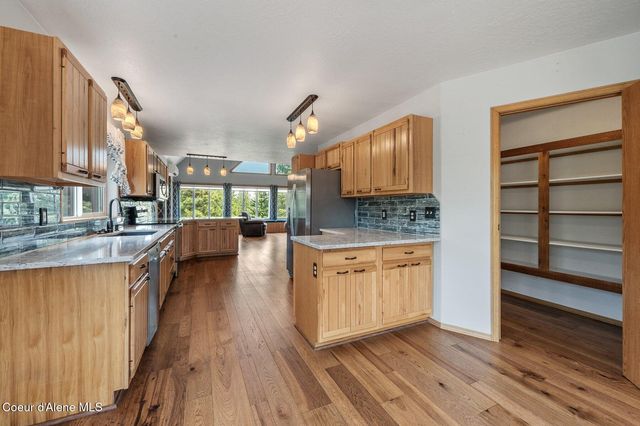 9067 W COEUR D ALENE DR, Spirit Lake, ID 83869