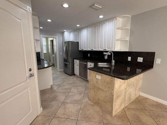 230 FORTUNA Drive, Palm Beach Gardens, FL 33410