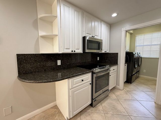 230 FORTUNA Drive, Palm Beach Gardens, FL 33410