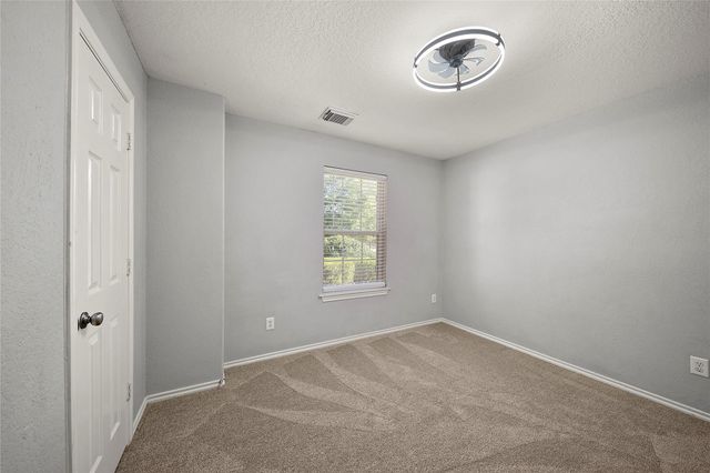 62 Rookwood Court, The Woodlands, TX 77382