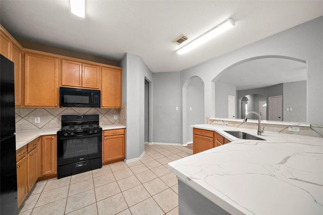 62 Rookwood Court, The Woodlands, TX 77382