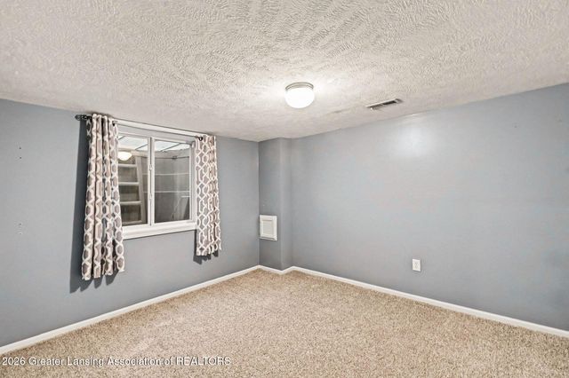 1706 Laurelwood Drive, Holt, MI 48842