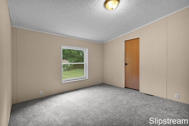 5705 E Riverside Drive, Lyons, MI 48851