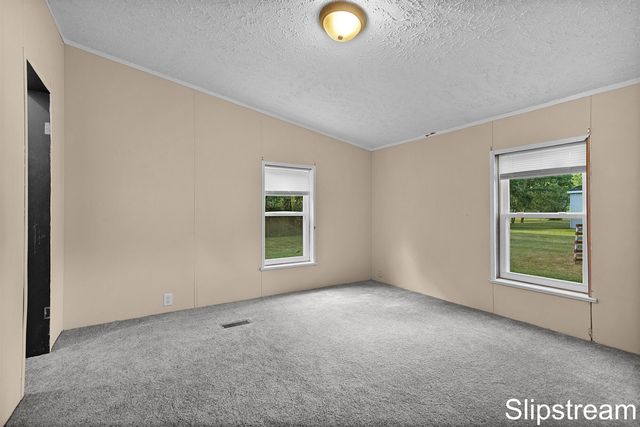 5705 E Riverside Drive, Lyons, MI 48851