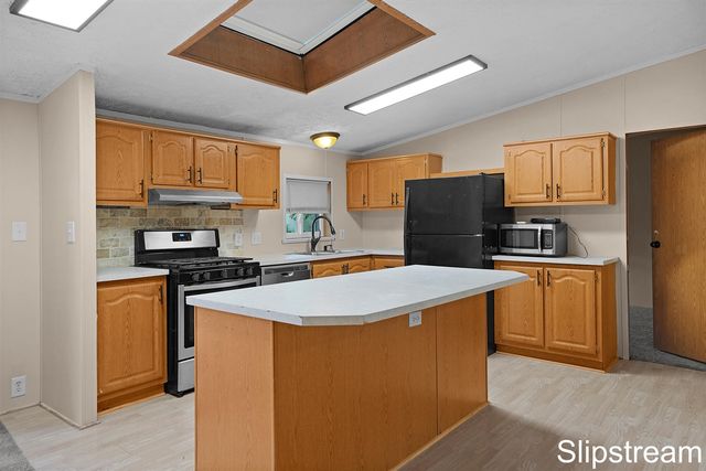 5705 E Riverside Drive, Lyons, MI 48851