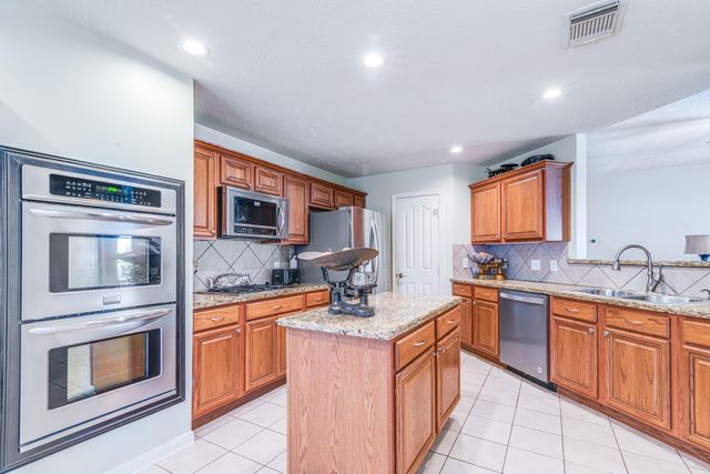 410 Scarlet Sage Drive, League City, TX 77573