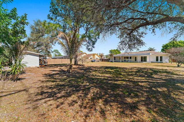 5883 Set N Sun Place, Jupiter, FL 33458