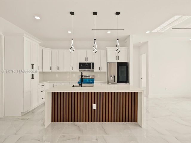 735 Chavers St, Lehigh Acres, FL 33974