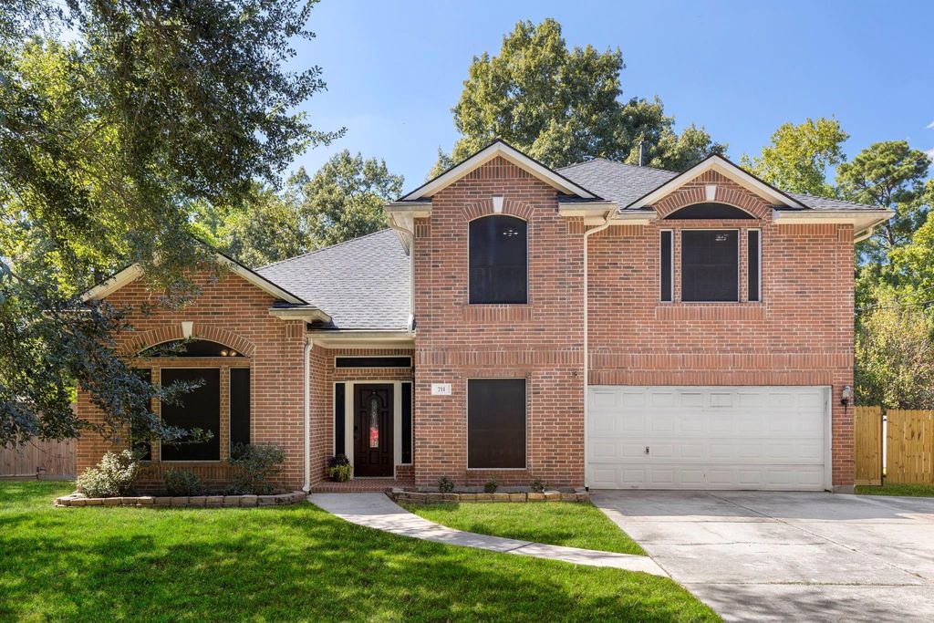 711 Shadberry Drive, Magnolia, TX 77354