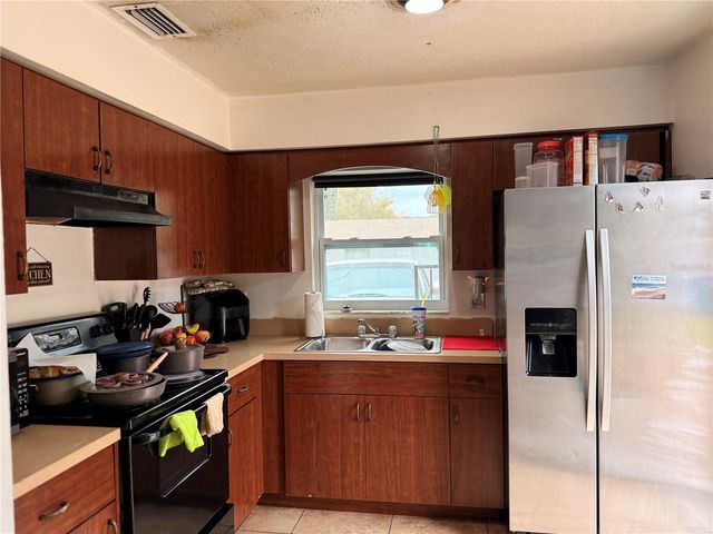 1407 E 99TH AVENUE, Tampa, FL 33612