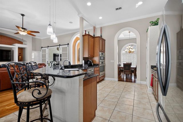 10107 TWEEN WATERS STREET, Clermont, FL 34715