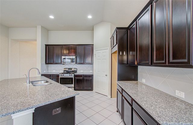 15702 Whisper Woods Drive, Cypress, TX 77429