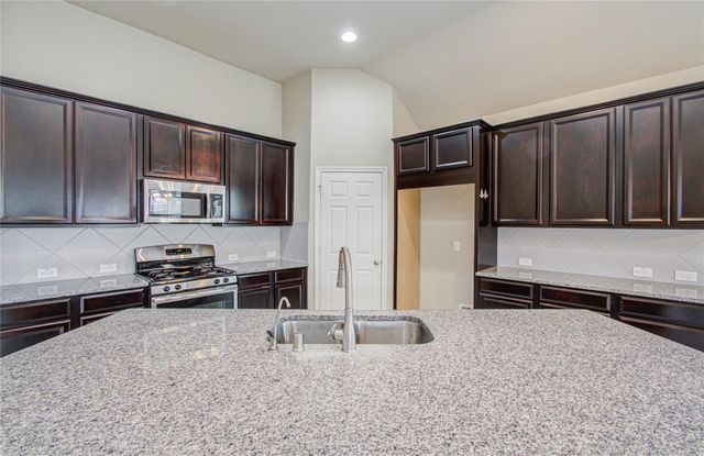 15702 Whisper Woods Drive, Cypress, TX 77429