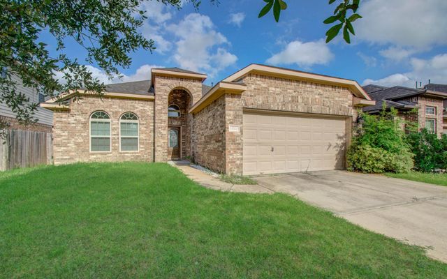 15702 Whisper Woods Drive, Cypress, TX 77429