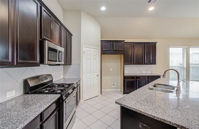 15702 Whisper Woods Drive, Cypress, TX 77429