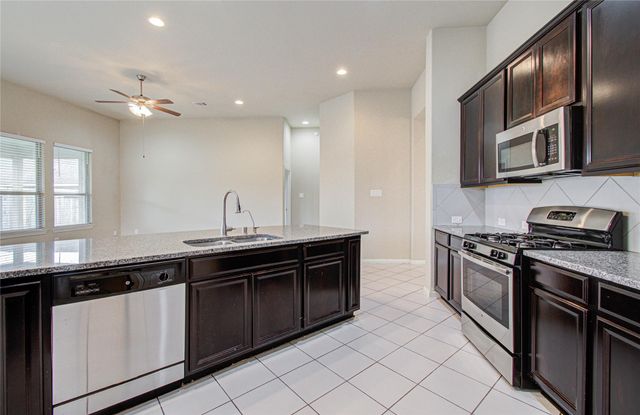 15702 Whisper Woods Drive, Cypress, TX 77429