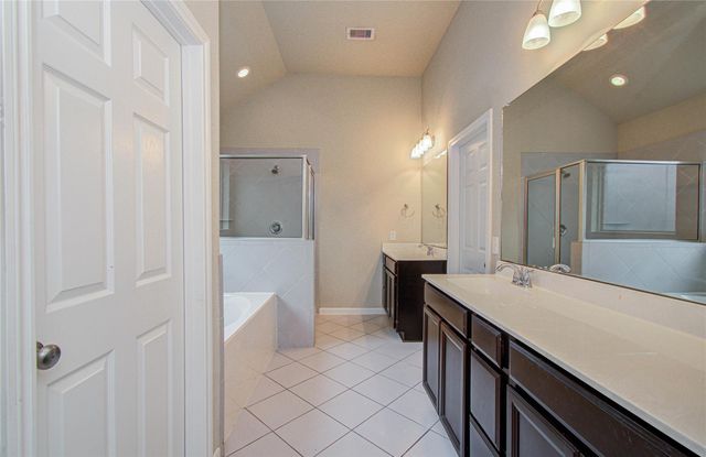 15702 Whisper Woods Drive, Cypress, TX 77429