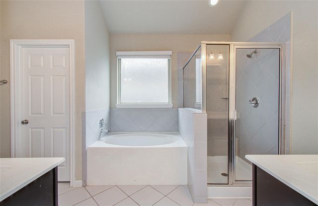 15702 Whisper Woods Drive, Cypress, TX 77429