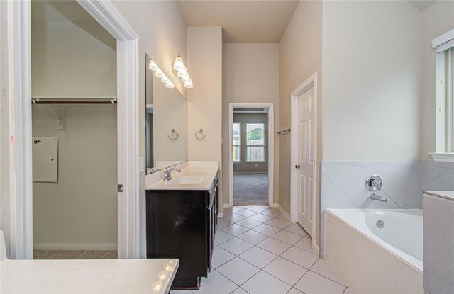 15702 Whisper Woods Drive, Cypress, TX 77429