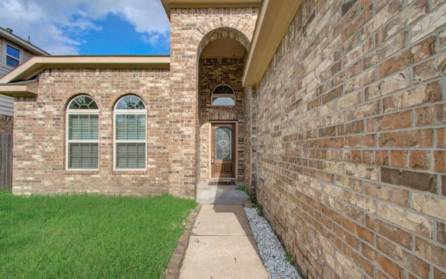 15702 Whisper Woods Drive, Cypress, TX 77429