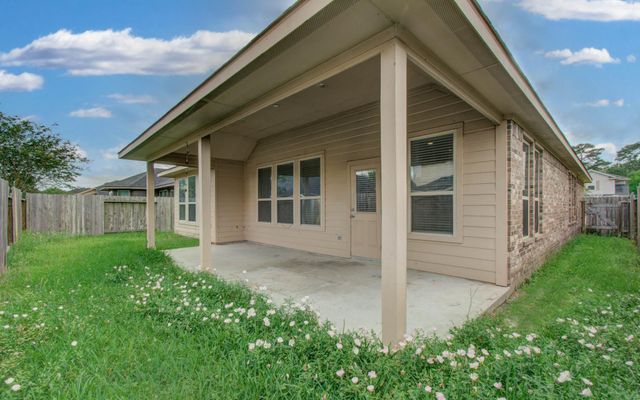 15702 Whisper Woods Drive, Cypress, TX 77429