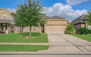 15702 Whisper Woods Drive, Cypress, TX 77429