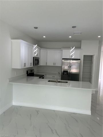 701-703 W 12th ST, Lehigh Acres, FL 33972