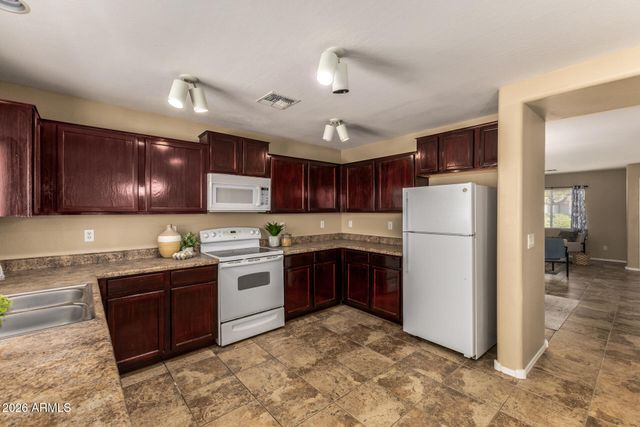 11566 W PURDUE Avenue, Youngtown, AZ 85363