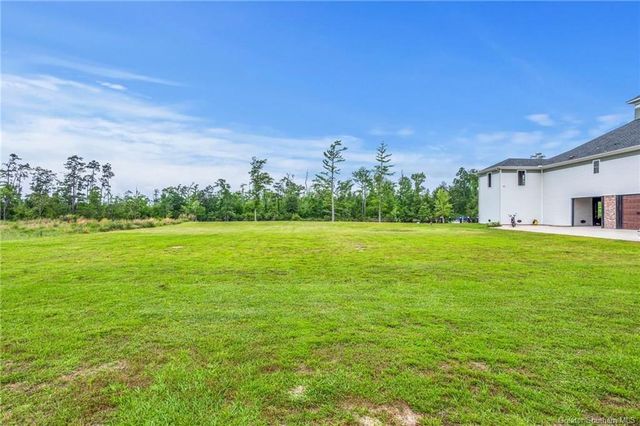 3939 River Moss Lane, Westlake, LA 70669