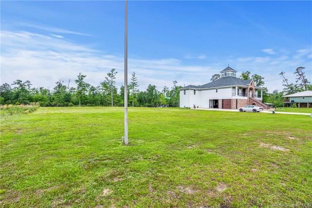 3939 River Moss Lane, Westlake, LA 70669