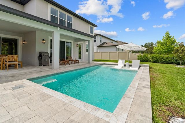 7754 HEMLOCK SEED DRIVE, Wesley Chapel, FL 33545